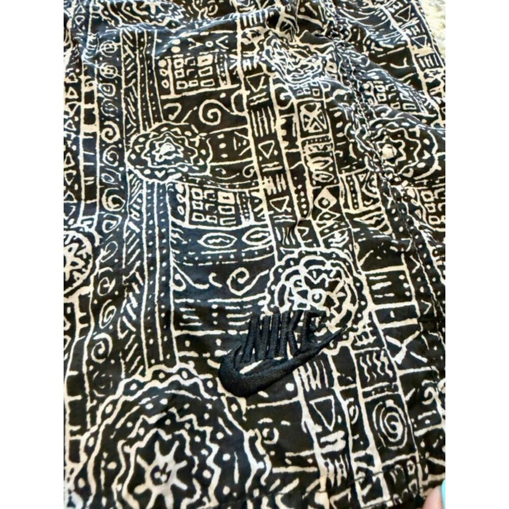 Vintage 1990s Nike boys youth medium tribal/geometric print nylon shorts